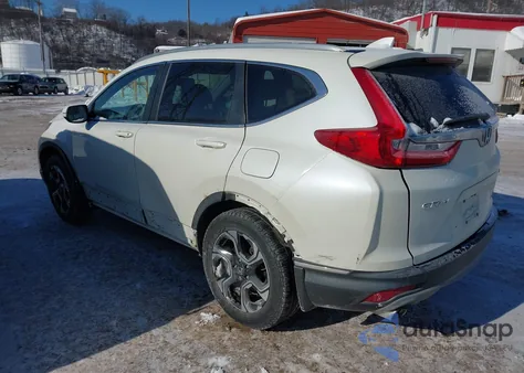 2017 Honda Cr-V Touring z USA, uszkodzony, nr VIN 2HKRW2H96HH614697